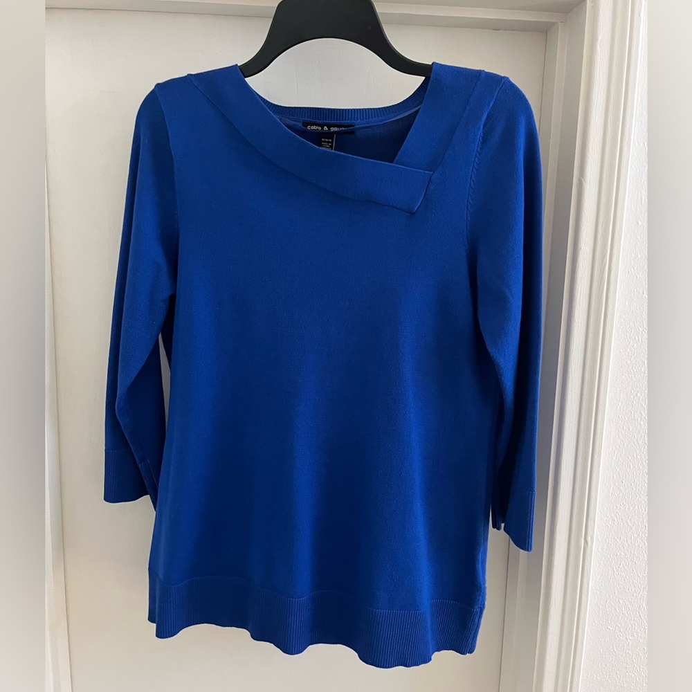 A Royal Blue Cable & Gauge asymmetrical neck line sweater in a size Medium